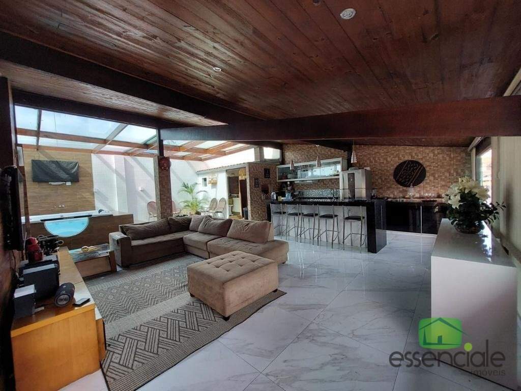 Casa de esquina com 4 quartos, suíte com hidromassagem e espaço gourmet – 6 vagas de garagem