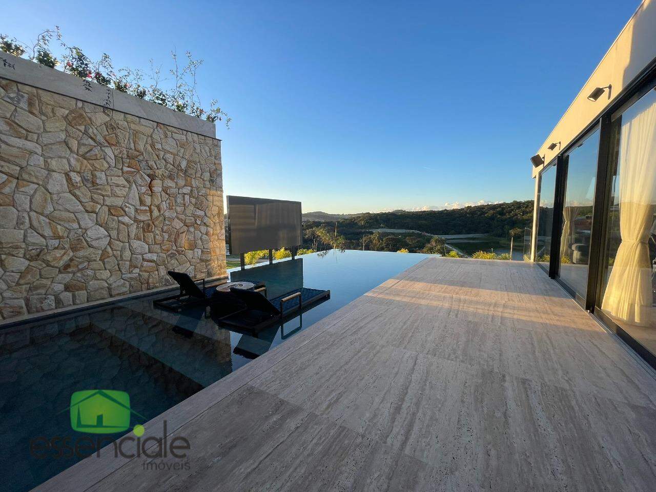 Casa alto padrão em condomínio 4 suítes 6 vagas à venda de porteira fechada por R$ 10.990.000,00.